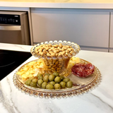 Boleira Ambar com petiscos na bancada