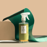 borrifador verde com cheiro e aroma para ambiente