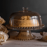 Boleira Prato para Bolo Petisqueira Pearl de Cristal com Pé e Tampa Âmbar 31cm x 25cm - Ela Decora