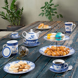 Caneca de Porcelana com Tampa e Filtro Infusor Elsa Azul Branco 310ml - Ela Decora