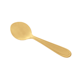 Colher de sobremesa dourada com cabo oval fundo branco