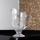 jarra de cristal com coqueiro