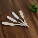 quatro espatulas prata brilhante