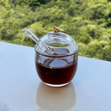 Meleira com colher e tampa de cristal transparente