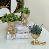 Vaso Cachepot Bob Deitado de Frente em Poliresina Dourado - 16 x 9,7 cm - Ela Decora