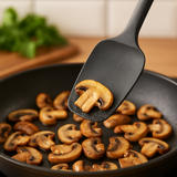 Espátula preta silicone com comida