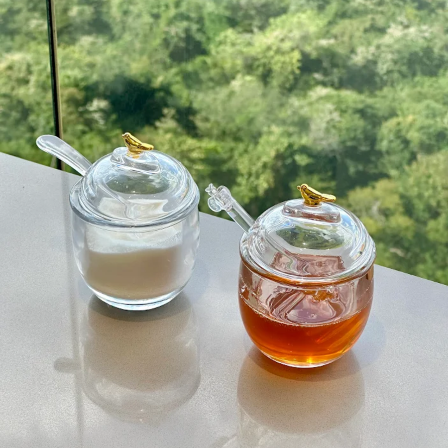 Kit açucareiro e meleira de vidro transparente com passarinho dourado na tampa