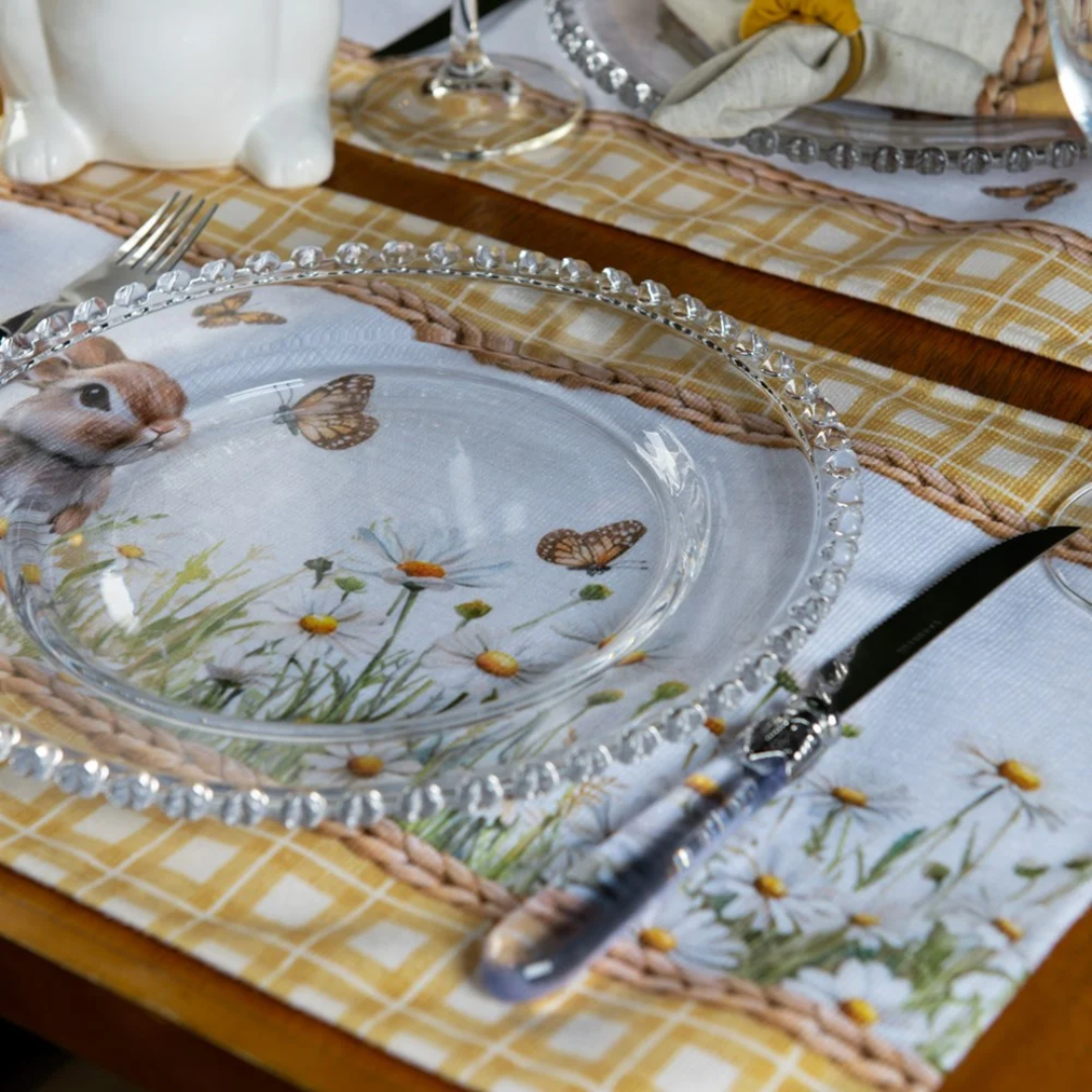 Lugar americano de Páscoa decorando mesa com prato e talheres