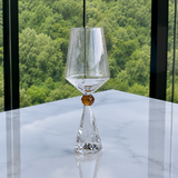 Taça ambar base cristal na bancada