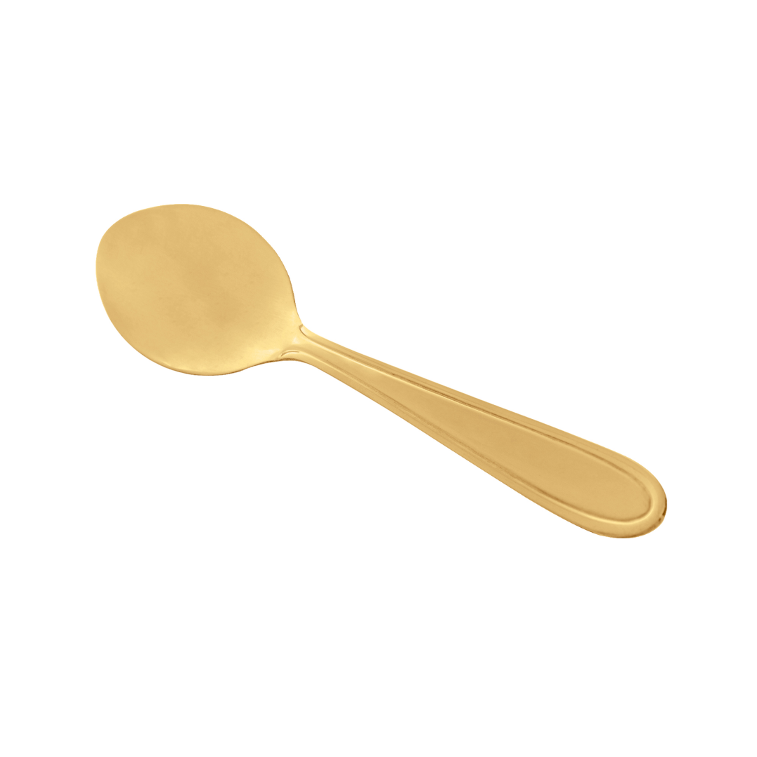 Colher de sobremesa dourada com cabo oval fundo branco