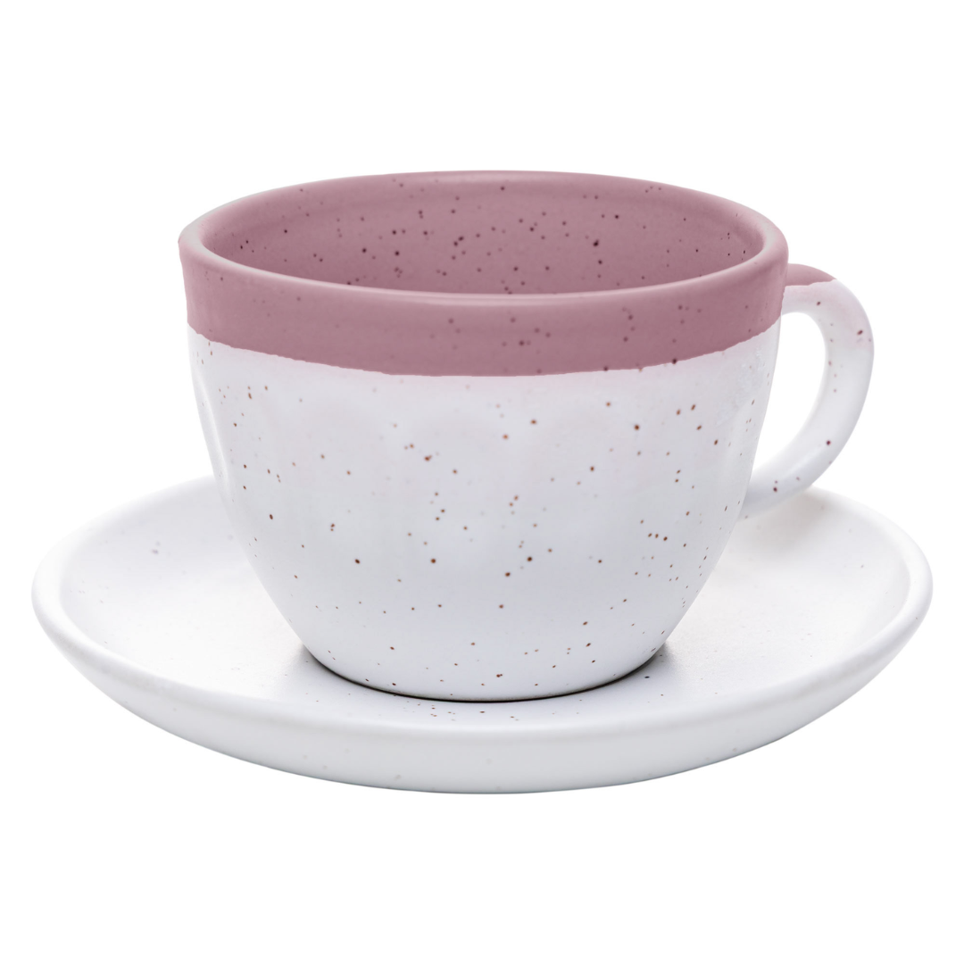 xícara de chá cerâmica com interior rosa e base branca salpicada